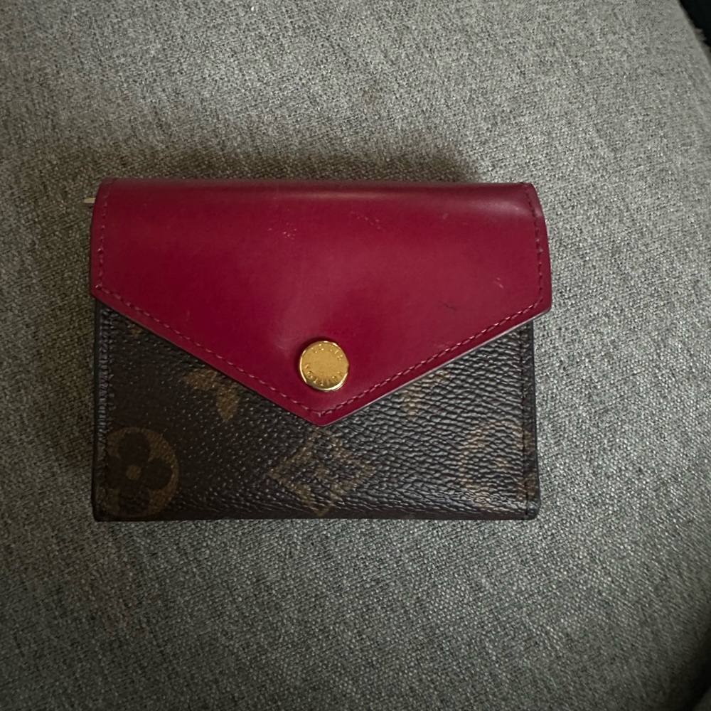 Louis Vuitton Monogram Zoe Wallet.